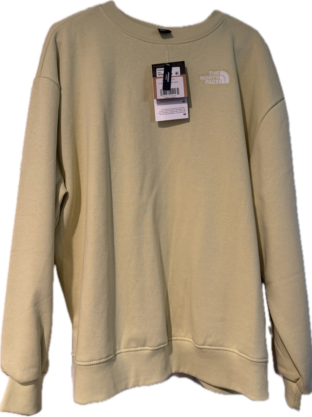 The North Face Women’s Crewneck Sweatshirt in pale yellow